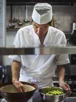 chef-working-in-the-kitchen-of-a-japanese-sushi-re-2022-03-04-02-24-19-utc-min